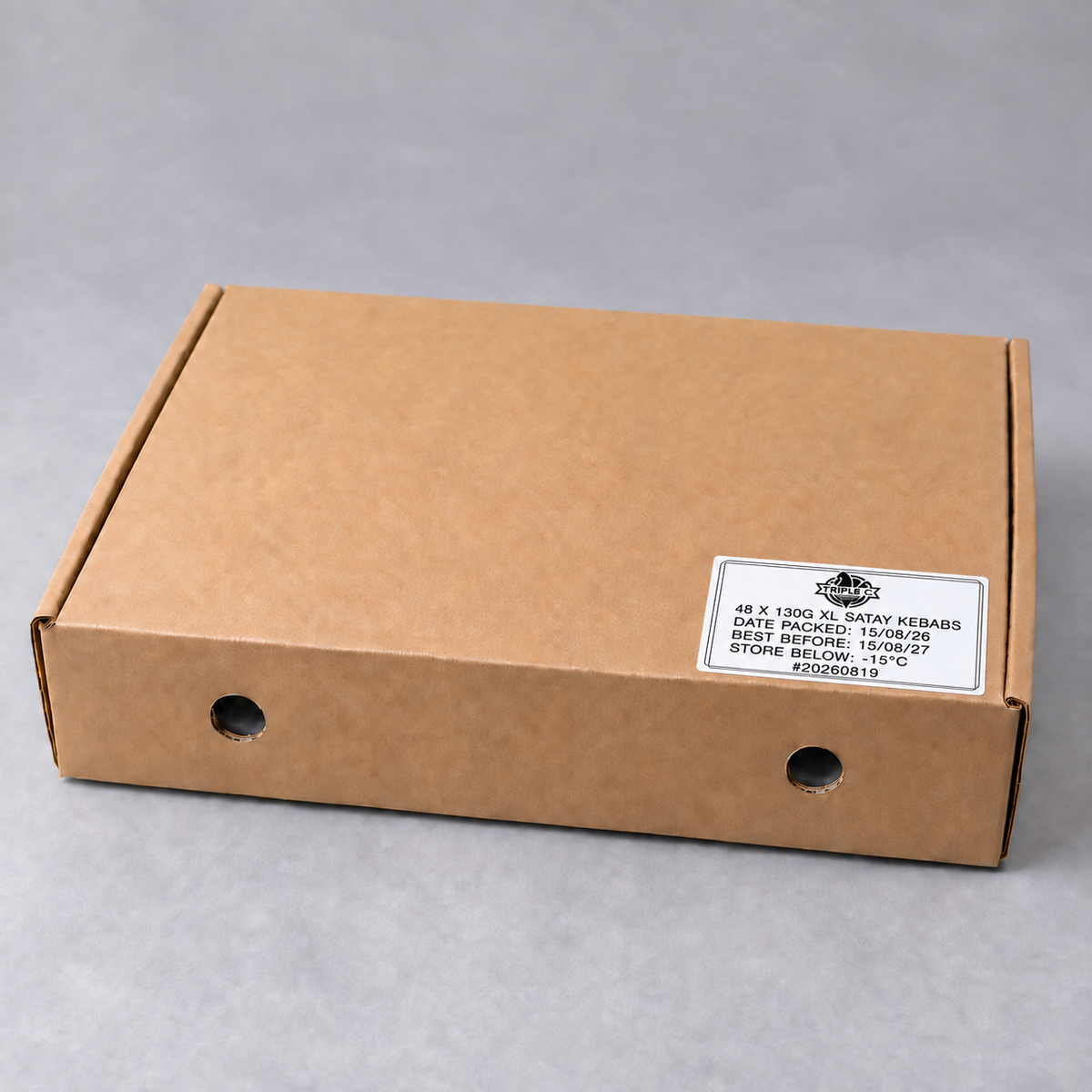 Brown carton labelled 48 × 130g XL Satay chicken kebabs on a light grey background.