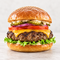Cooked Angel Bay 150g Angus beef burger with cheese, lettuce, tomato, pickles and burger sauce