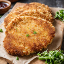Cooked 200g crumbed chicken breast schnitzels serving suggestion – 40 per carton