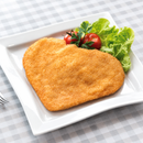 Superior XL 280g crumbed chicken breast schnitzel on a white plate with lettuce and cherry tomatoes; serving suggestion.
